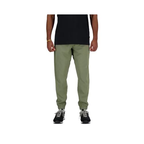 Pantalón New Balance Active Woven - Verde — Fitpoint